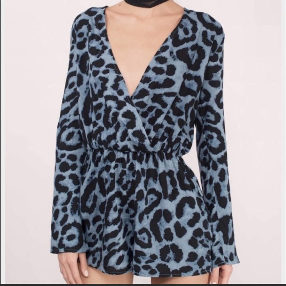 Tobi gray cheetah print romper size Small.